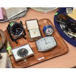 A tray of vintage clocks inc. a Smiths dashboard clock, a faux snakeskin cased Smiths travelling