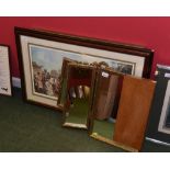 A group of framed prints and mirrors