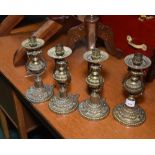 A set of four gilt metal candle sticks/sconces in 19th century style