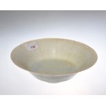 A Chinese song type bowl with incised decoration to the bowl. Diameter 22.5cm