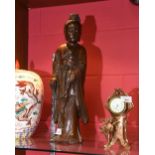 A Chinese hardwood figure