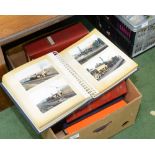 A box of albums containing photographs of locomotives