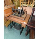 A CSW Federation family sewing machine,  no. 434092 in wooden case and pedal table