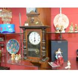 A mahogany cased wall clock