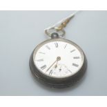 A silver cased open faced pocket watch & key, the dial with Roman numerals and Arabic numerals on