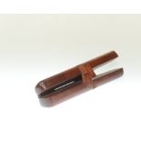 A mahogany travelling boot pull