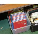 A box containing a quantity of film review books by F Maurice Speed c. 1940s/50s