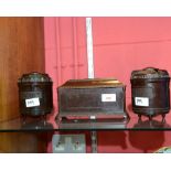 A group of 1930s bakelite storage containers comprising: sarcophagus form caddy, tea caddy and