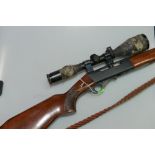 An Anchutz model 520 .22 LRRF auto, screw cut for moderator, 8x56 Gammo scope, leather platted sling