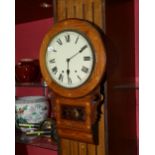 An inlaid mahogany wall clock