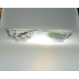 Two Chinese famille rose porcelain bowls decorated with pheasants amongst flowering foliage, both