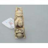 A Chinese ivory netsuke of a Liu Hai sporting with the toad (a/f)