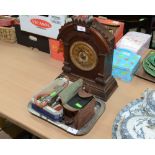 An oak cased mantle clock; tog. with a tray of miscellaneous