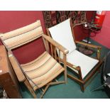 A folding garden chair with a wooden frame and canvas seat; tog. with a vintage directors chair