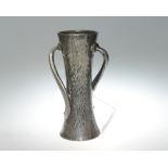 A Solkets for Liberty & Co English pewter twin handled vase with hammered decoration in the Art