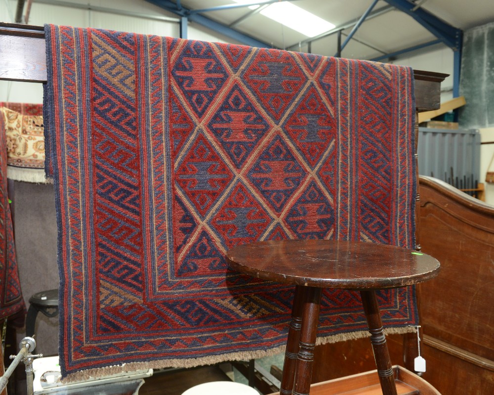 A tribal Gazak style carpet. 107x125
