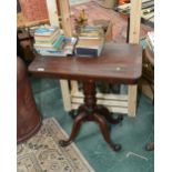 A 19th century mahogany pedestal table, the rectangular top raised on four acanthus leaf carved