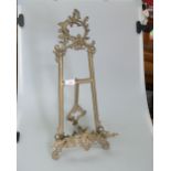 A Victorian brass table easel