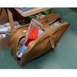 A vintage suitcase; tog. with curtains