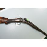 A Bott 20g top lever hammer gun, 28"/2 1/2" nitro barrels (some pitting), Prince Of Wales stock, lop