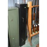 A wall mounted gun safe