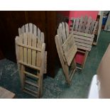 A set of four vintage wooden slatted garden chairs