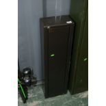 A wall mounted gun safe