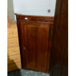 A George III satinwood inlaid mahogany hanging corner cupboard