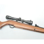 A Webley Xocet air rifle; tog. with a Walther 4X32 scope .22 cal in gun slip