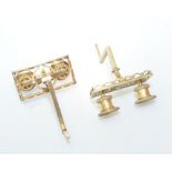 A pair of 19th century twin light brass piano sconces