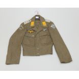 A Third Reich Luftwaffe wool tunic, Lt. Rank collar boards, medical corps pin etc