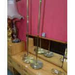 A pair of brass standard lamps