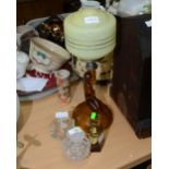 A 1920s Art Deco amber glass table lamp; tog. with three glass scent bottles