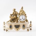 A French figural gilt metal mounted alabaster mantel clock by JW Benson, the white enamel dial