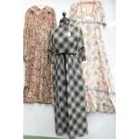 Three 1970s maxi dresses; a Quaid green/pink/brown paisley print long sleeved dress; a black and