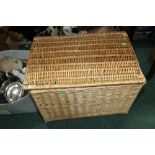 A large wicker hamper and contents