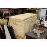 A wicker laundry box