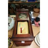 A mahogany cased wall clock