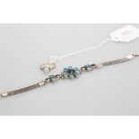 An single opal ring together with a coloured glass flower bracelet on white metal strap (2)