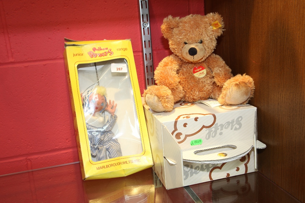 A modern Steiff Teddy bear in original box