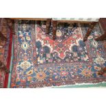 An antique Persian Mazleghan. 1.82m x 1.27m