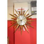 A retro Metamec sunburst wall clock