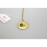 A Chinese 14ct gold jade mounted gold pendant on chain