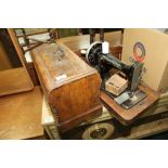 A vintage Frister & Rossmann oak cased sewing machine with Tunbridge inlay