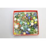 A bag of vintage glass marbles