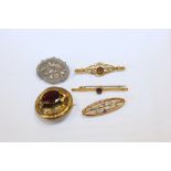 A group of Edwardian silver and gold brooches inc. three bar brooches mounted with amethysts and