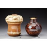 * EMILE LENOBLE (1876 - 1939) Vase bombé en grès émaillé marron et crème à décor de frises à