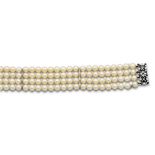 Pulsera años 50 con cuatro hilos de perlas cultivadas y cierre de brillantes y zafiros en platino.