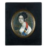 ESCUELA FRANCESA, PP. SIGLO XIX Retrato de dama en un paisaje Miniatura sobre marfil, óvalo. 9,5 x 8