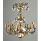Lámpara de doce brazos de luz con bolas en cristal azogado. Inglaterra, S. XIX. Medidas: 73 x 60
